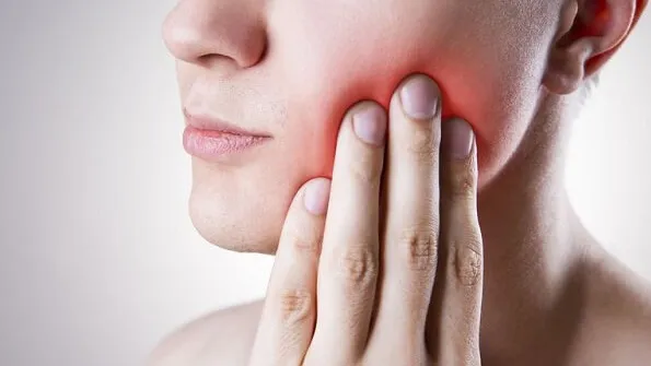 Sự sưng sau khi nhổ răng khôn: thời gian và cách giảm sưng đau